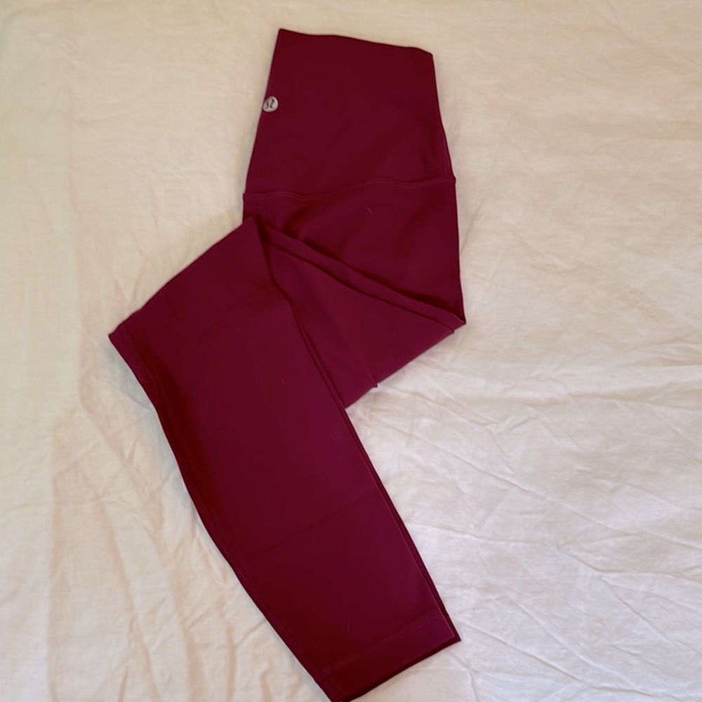 Like new lululemon Align25” leggings. Size 4. Raspberry/dark pink.
